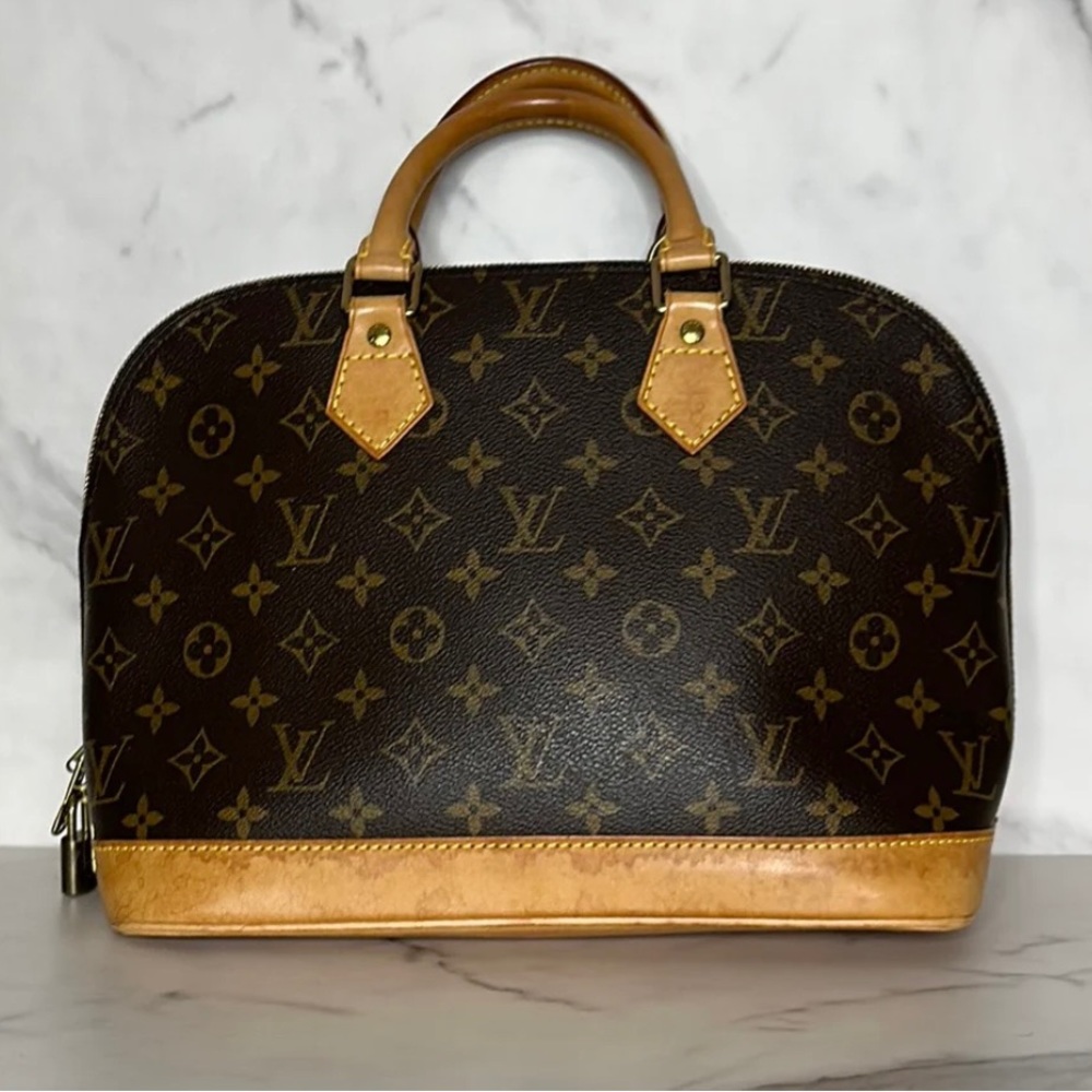 Authentic LV Alma PM - comes with authentication receipt